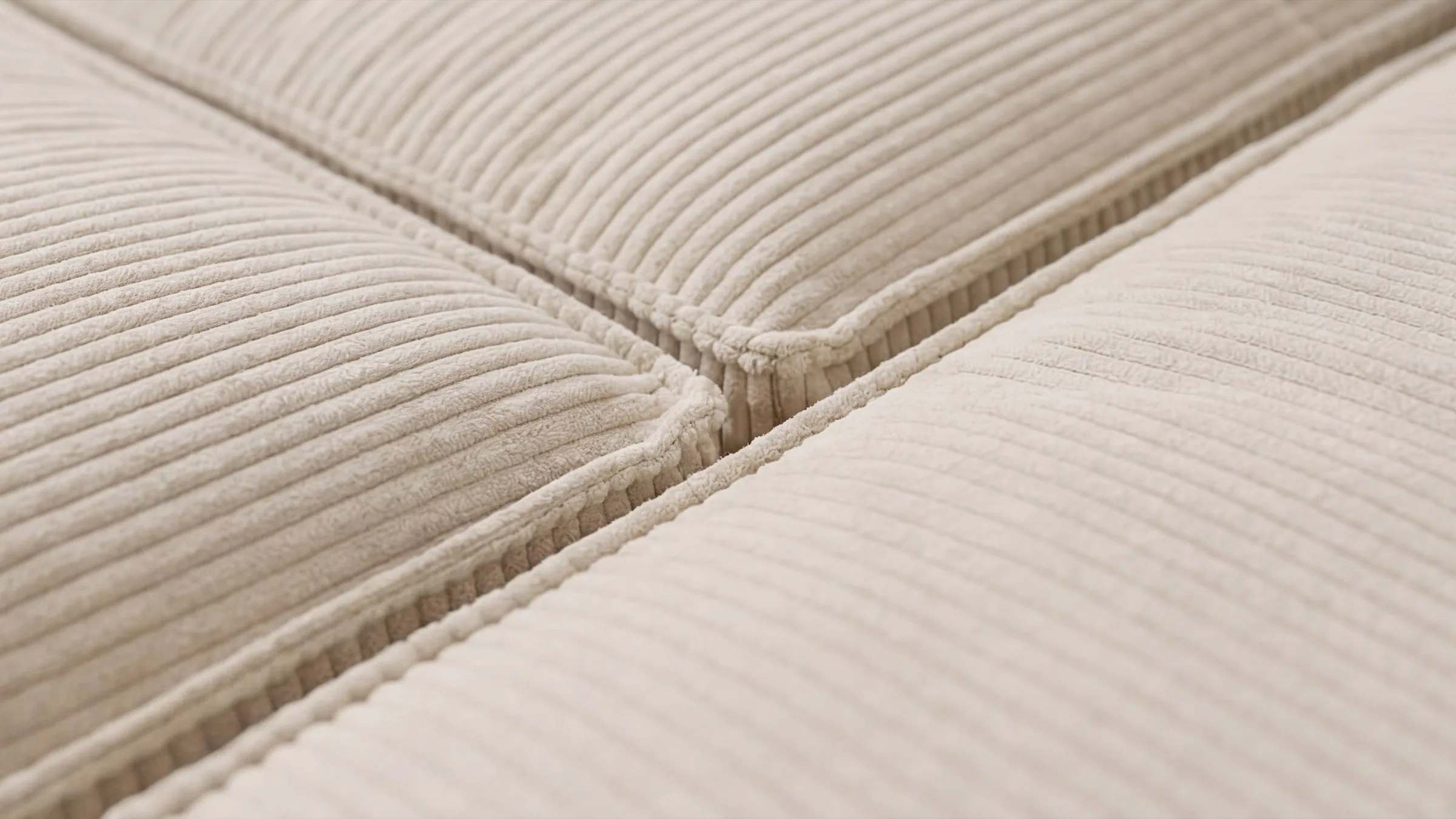 Seat surface and seam in cream corduroy