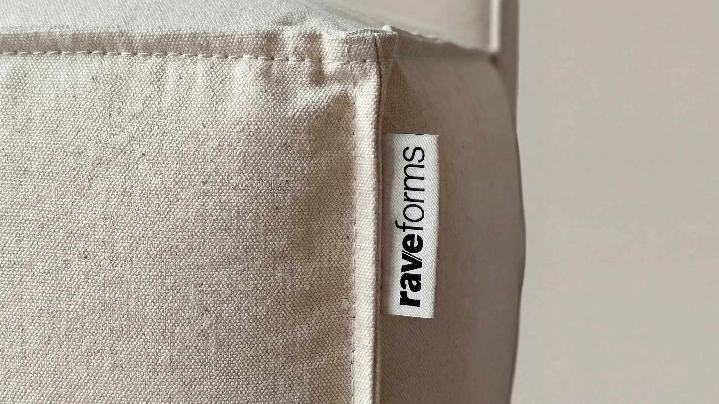Woven raveforms label on a cotton cover